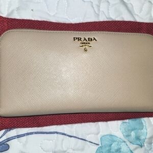 PRADA BEIGE SAFFIANO LEATHER ZIP AROUND WALLET Pre-loved Reposhing